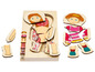 Ein Holzpuzzle mit einem Mädchen und seiner Anatomie, inklusive Muskeln und Skelett.