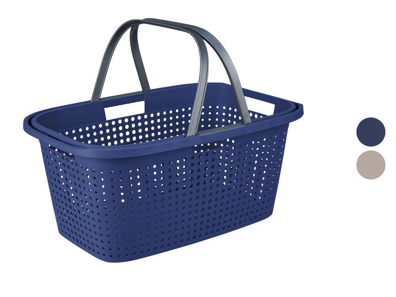 Blauer Plastik-Wäschekorb und -behälter mit Griffen.