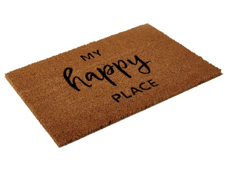 Eine braune Fußmatte mit der Aufschrift 'My happy place'.