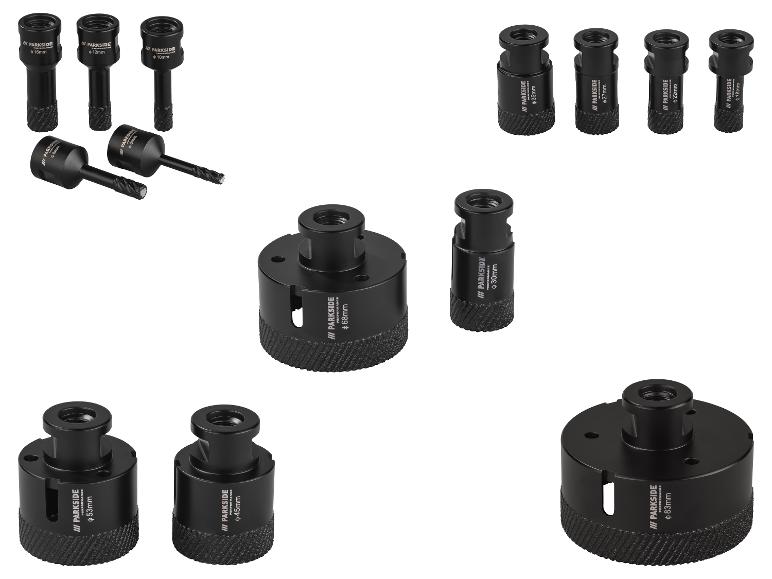 Ein Satz schwarzer Bohrer und Lochsägen in verschiedenen Größen.