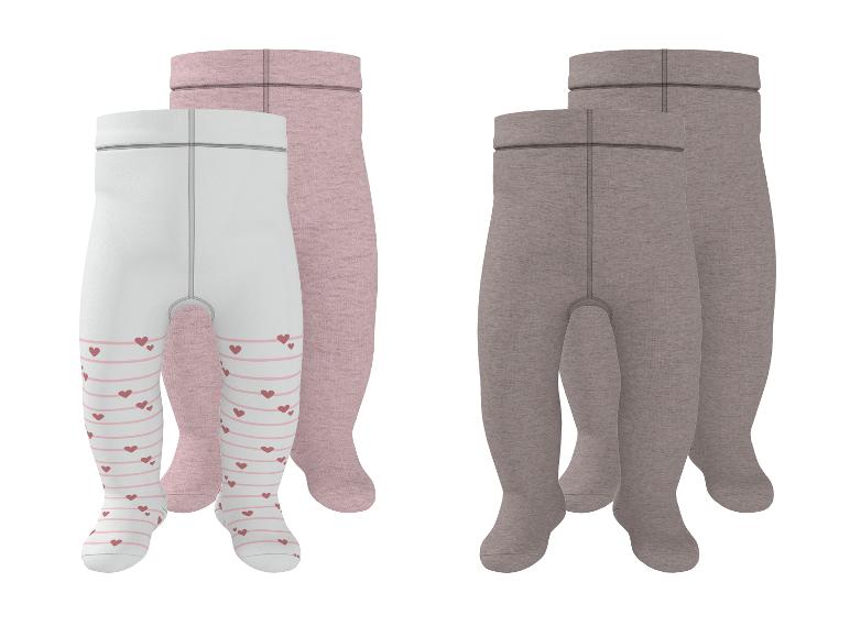 Baby-Strumpfhosen in Rosa und Grau, mit Herzen und Streifen.