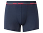 Dunkelblaue Happy Shorts Boxershorts mit rot-weißem Band.