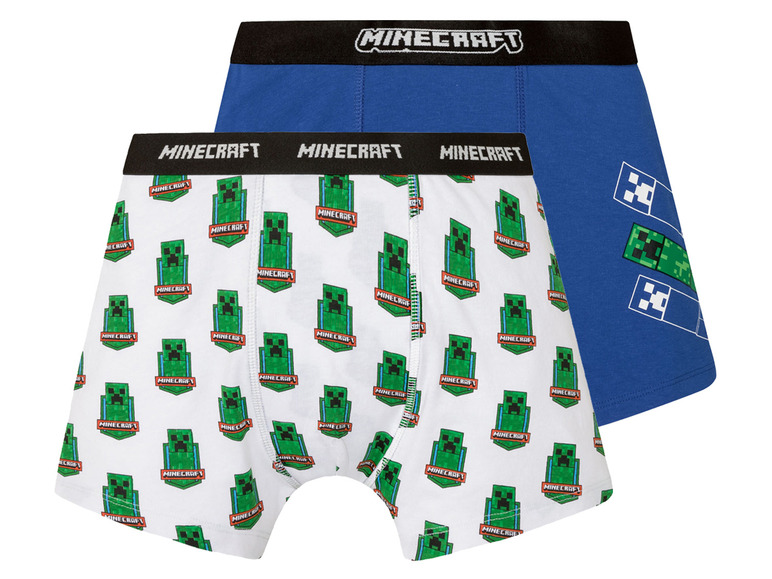 Zwei Minecraft Boxershorts, eine weiße mit grünem Creeper-Druck und eine blaue mit Creeper-Logo.