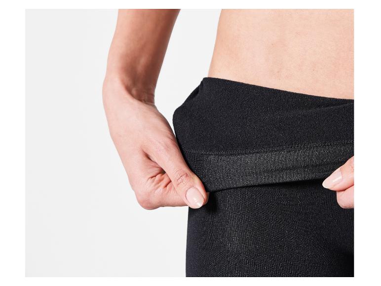 Schwarze Leggings mit breitem Bund.