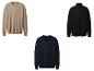 Drei Herrenpullover: ein beiger Rundhals, ein schwarzer Rollkragen und ein dunkelblauer V-Ausschnitt.