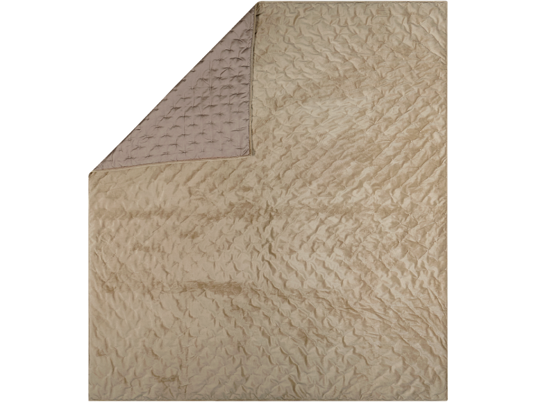 Beige, gesteppte Decke mit geprägter Textur und kleinen Perlen.