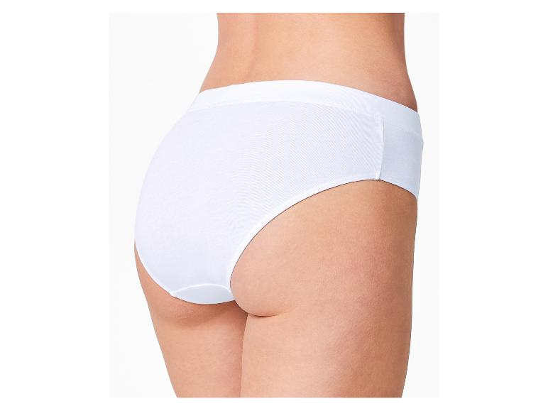 Rückenansicht einer Frau in weißem Slip.