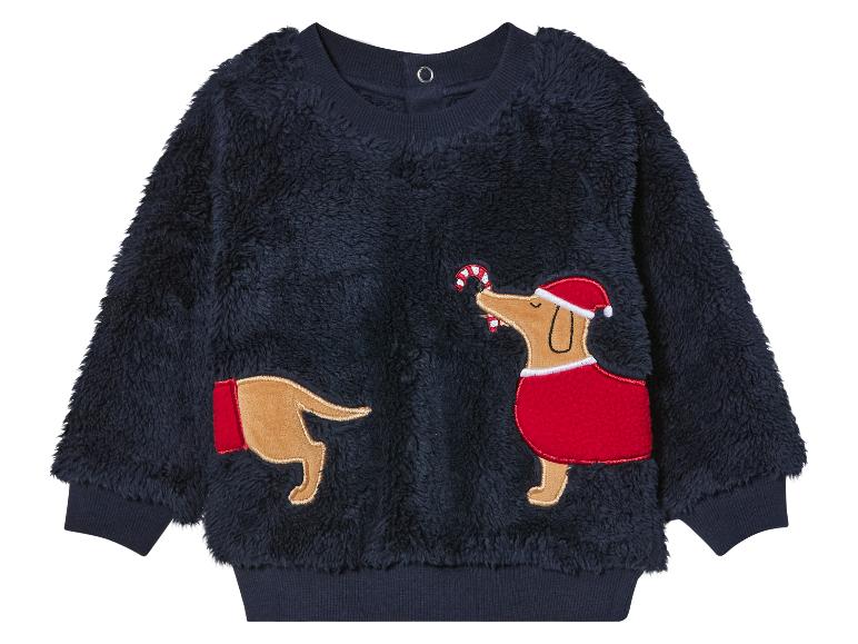 Ein dunkelblauer Fleece-Pullover mit Weihnachts-Hundedesign.