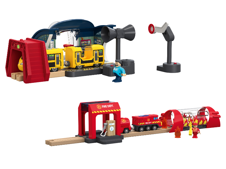 Spielzeugeisenbahn-Set mit gelber U-Bahn-Station und roter Feuerwache.