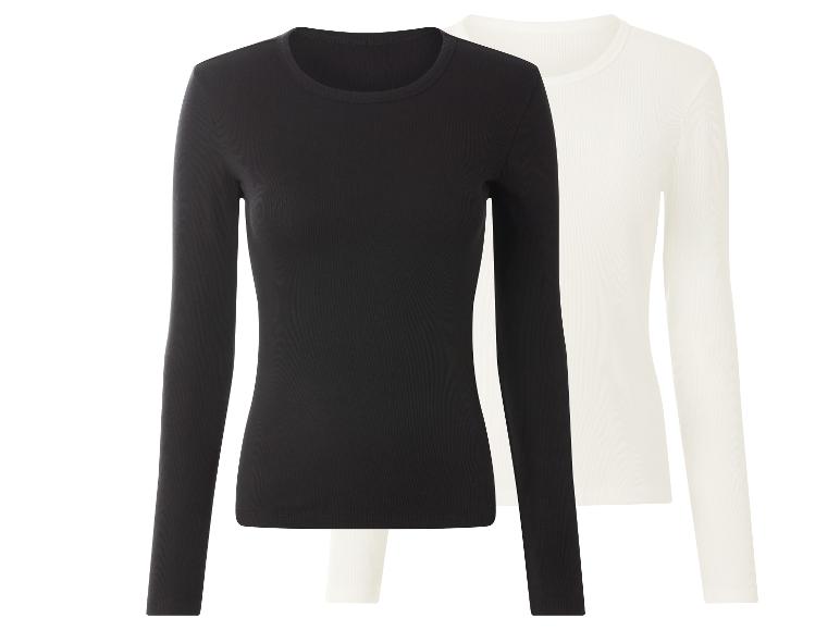 Zwei Damen-Langarmshirts, schwarz und weiß, aus geripptem Stoff.