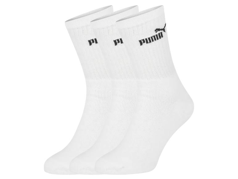 Drei Paar weiße Puma Socken.