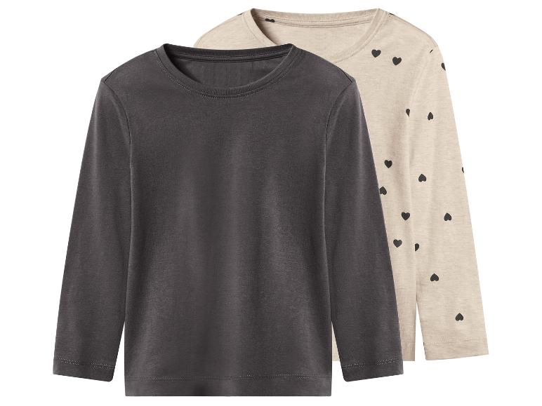 Set aus zwei Langarmshirts, eines dunkelgrau und eines beige mit schwarzen Herzen.