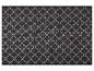 Fußmatte mit geometrischem Kleeblattmuster in Schwarz und Weiß.