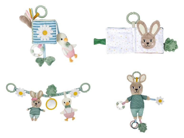 Baby-Aktivitätsset: ein weiches Hasenbuch, ein Spielbogen mit Ente und Hase und eine Rassel.