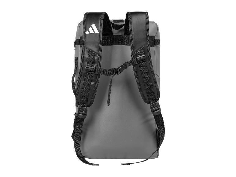 Grauer Rucksack mit schwarzen Trägern und weißem Logo oben.