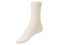 Ein weißer Wollsocken mit gerippter Struktur.