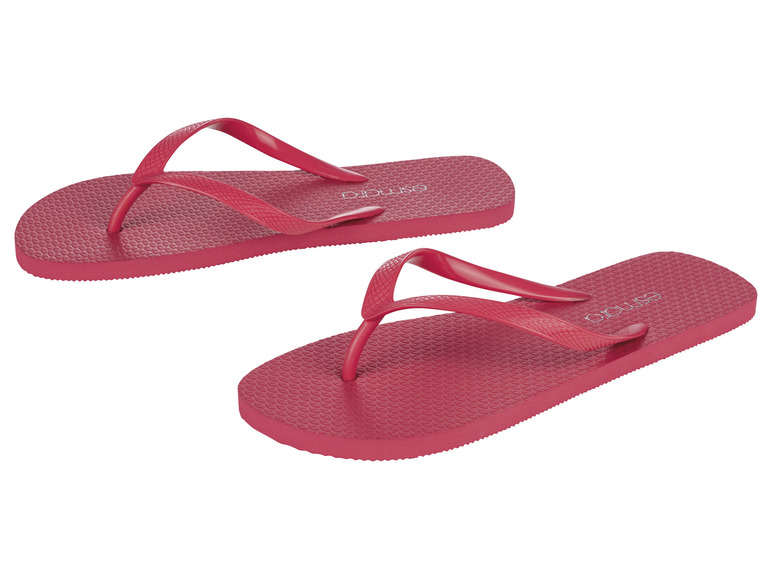 Zwei Paar rosa Flip-Flops der Marke 'Ipanema'.