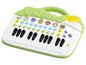 Ein grünes Spielzeugpiano mit Tiermotiven und Tasten.