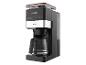 Schwarz-silberne Kaffeemaschine mit Digitalanzeige und Glaskanne.