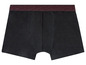 Schwarze Boxershorts mit rotbraunem Bund.