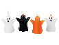 Vier Halloween-Kerzen in Gespensterform in Weiß, Schwarz und Orange auf schwarzem Hintergrund.