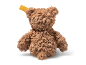 Weicher brauner Teddybär von hinten fotografiert.