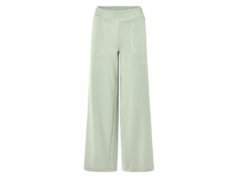 Eine hellgrüne Hose mit weiten Beinen.