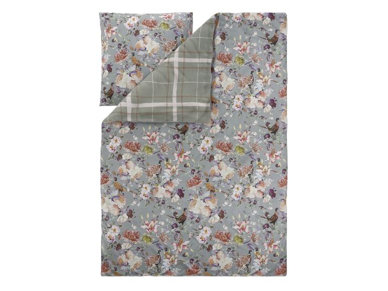 Bettwäsche-Set mit Blumen- und Vogelmuster sowie einem Karodruck.