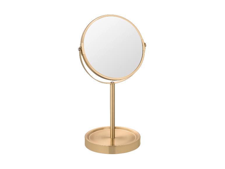Goldfarbener Tischspiegel mit rundem Rahmen.
