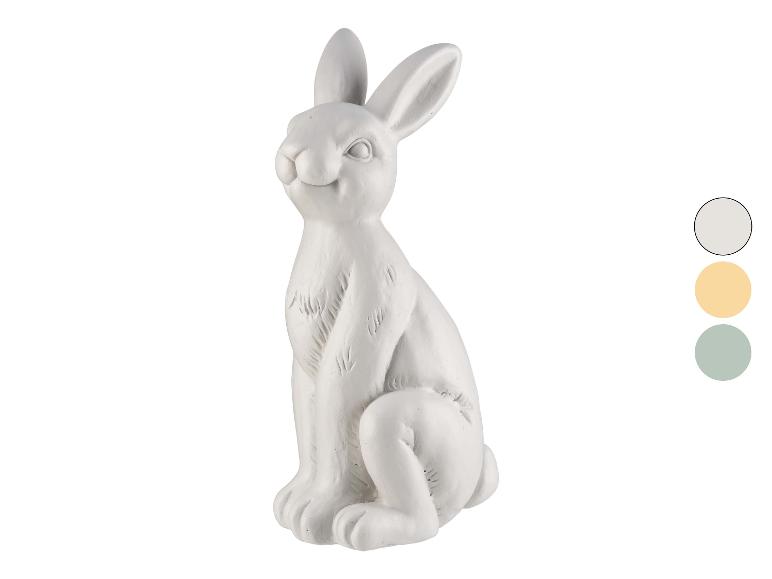Keramikfigur eines weißen Kaninchens, geeignet für Dekoration.