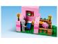 LEGO Minecraft Set mit einem rosa Haus, einem Skelett und einem Schwein.