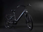 Ein schwarzes Myvelo E-Bike mit Gepäckträger.