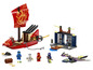 LEGO Ninjago Sets mit einem roten Boot, einem Gefängnis und einem Drachen.