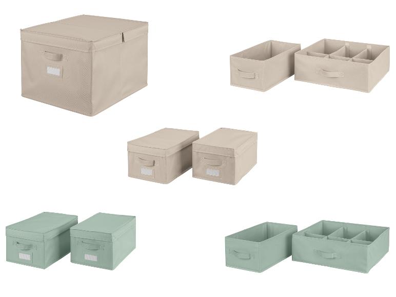 Beige und grüne Aufbewahrungsboxen mit Deckeln und Einteilungen für Schubladen.