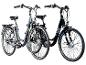 Zwei E-Bikes: ein graues und ein schwarzes Zündapp.