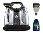 Bissell SpotClean Pet Select tragbarer Teppichreiniger mit Bürstenaufsatz und Reinigungslösung.