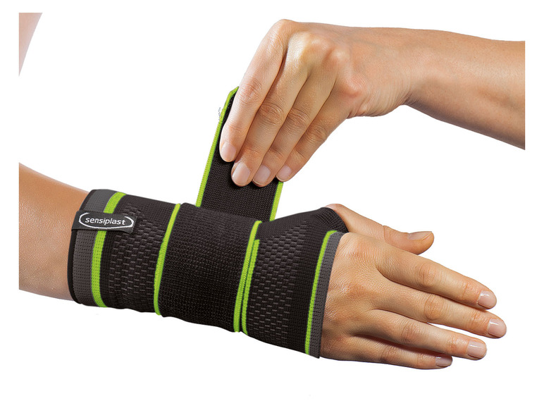 Ein schwarzes Handgelenkband von Sensiplast mit grünen Akzenten.