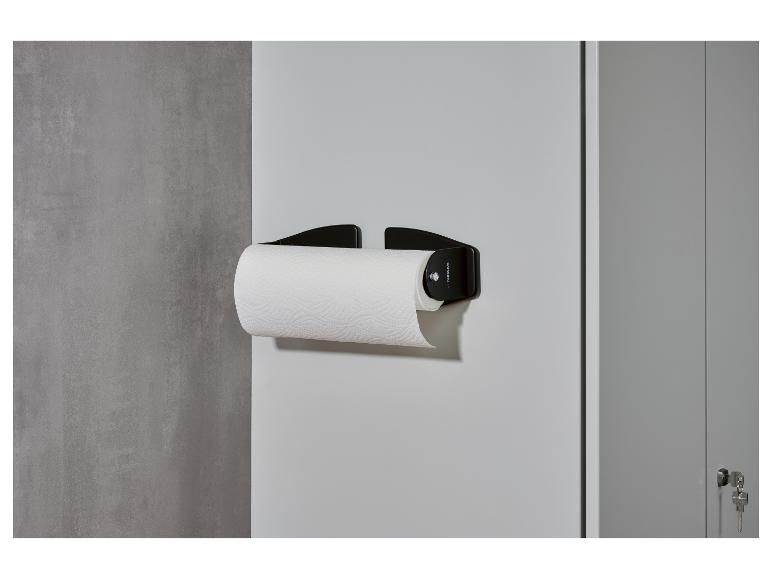 Schwarzer PARKSIDE Wand-Küchenrollenhalter mit einer Papierrolle.