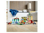 Lego City Set mit Tankstelle, Pizzeria und weiteren Gebäuden.