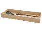 Bambus-Schubladenorganizer mit schwarzem Spatel, hölzernem Spaghettilöffel und Metallutensil.