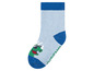 Blaue Socken mit Dinosaurier-Motiv.