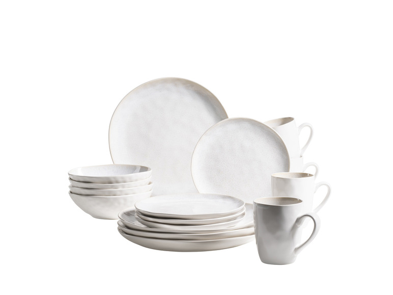 Ein Set weißes Geschirr mit Schalen, Tellern und Bechern.