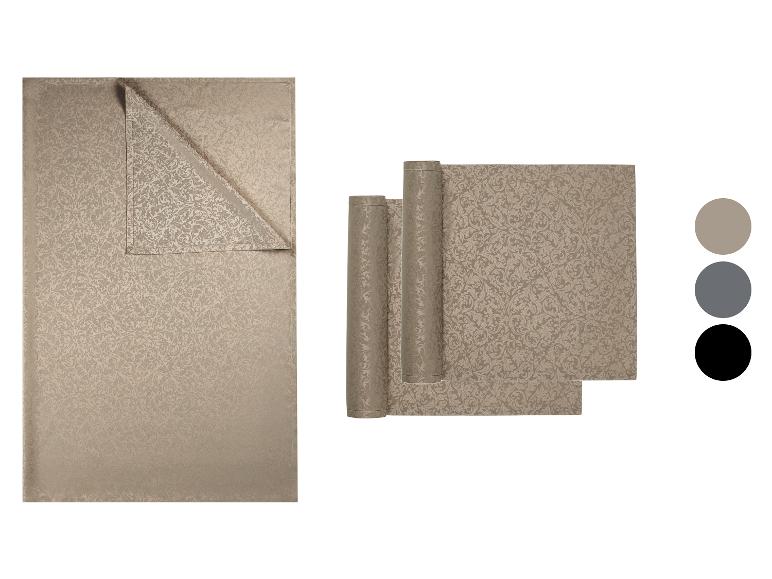 Tischdecken- und Tischset-Set mit beigem Damastmuster und Farbmustern.