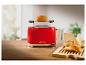 Roter Toaster 1995 mit Brot oben drauf.