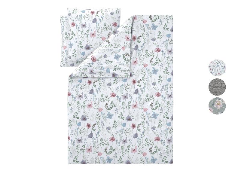 Bettwäsche-Set mit Blumenmuster in Weiß, Rosa und Blau.