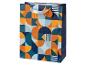 Geschenktüte mit geometrischem Muster in Orange, Marineblau und Hellblau.