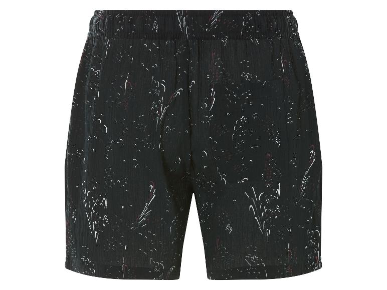 Schwarze Shorts mit stilisiertem Blumenmuster.