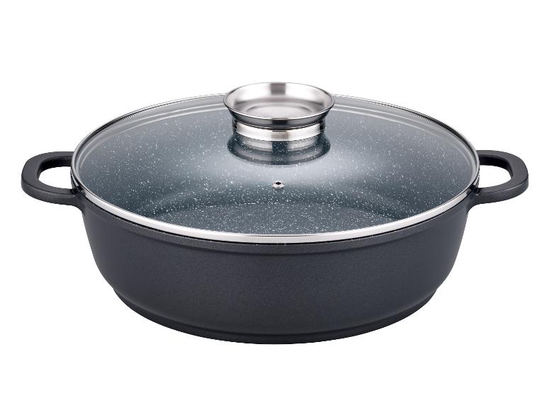 Ein schwarzer Topf mit Glasdeckel