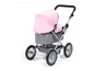 Ein rosafarbener Puppenwagen mit silbernen Rädern.