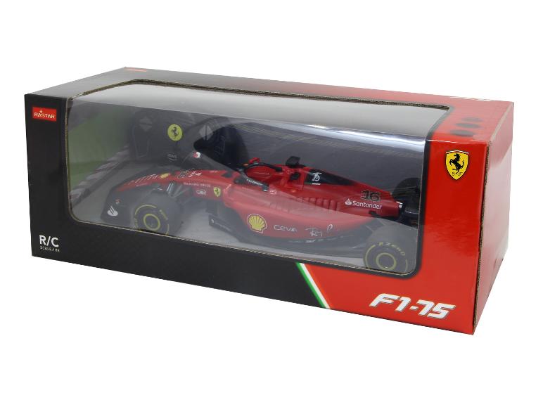 Ein rotes Ferrari F1-75 Rennauto von Rastar in einer Box.